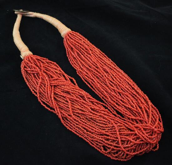 A mid 20th century multi strand coral bead necklace, 25in.